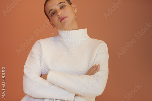 Young woman in white sweater
