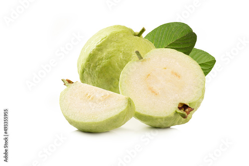 Guava fruits with in half and leaves on white background.