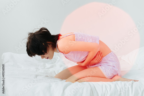 Woman Suffering From Pain During Period - PMS photo