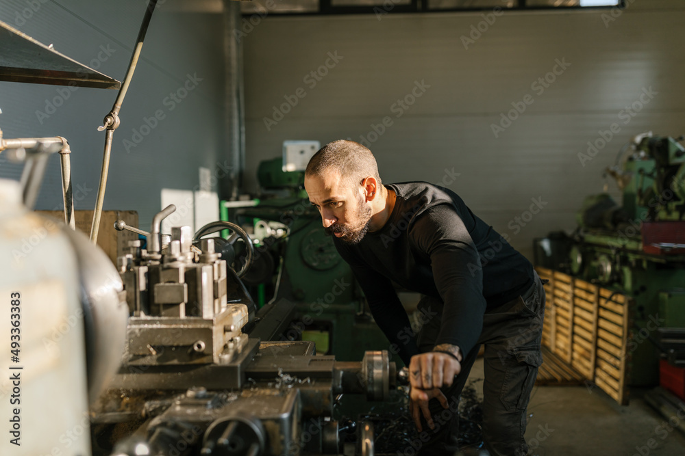 Man Working In His Workshop