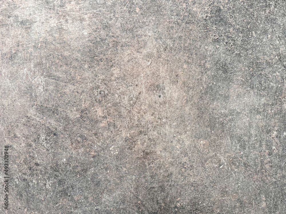 The cement flap surface has scratches, black and white stains, traces caused by plastering to create an artistic pattern The cement flap surface has scratches, black and white stains, traces caused by plastering to create an artistic pattern