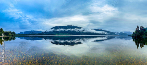 Lake Kaniere panorama on a cloudy rainy misty day on New Zealand's West Coast