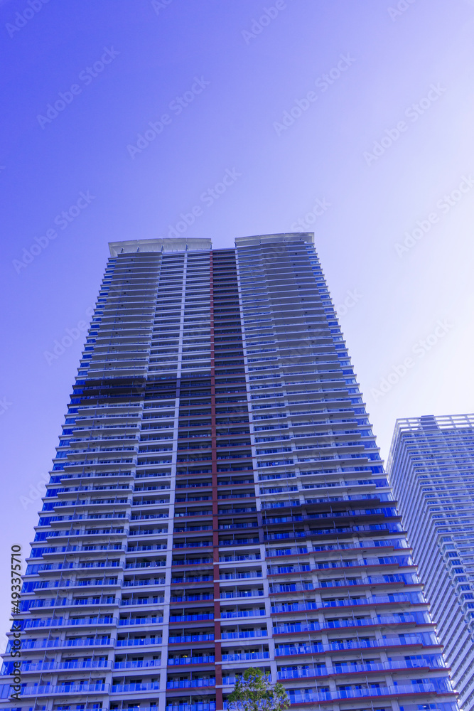 Landscape photograph looking up at a high-rise apartment_c_02