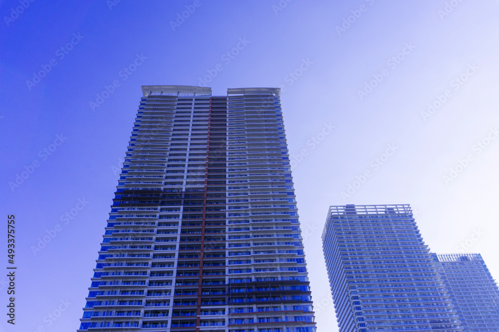 Landscape photograph looking up at a high-rise apartment_c_03