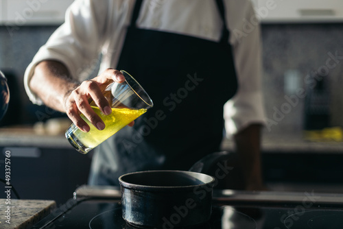 Pastry chef working in a modern kitchen