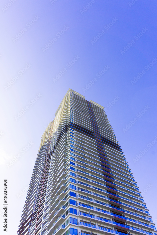 Landscape photograph looking up at a high-rise apartment_c_10