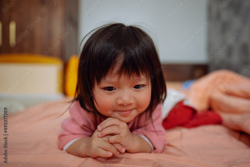 Cute little girl portrait on the bed Cute little girl portrait on the bed