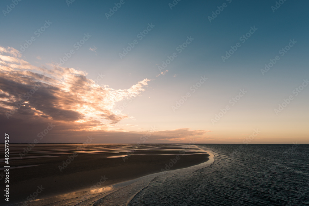 Wild empty beach at sunset Wild empty beach at sunset
