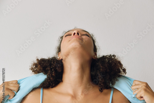 Woman stretching her neck  photo