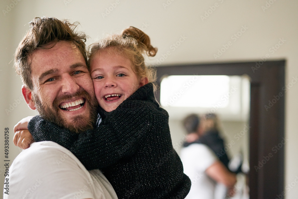 Cuteness and cuddles. Portrait of a father and daughter bonding together at home. Cuteness and cuddles. Portrait of a father and daughter bonding together at home.