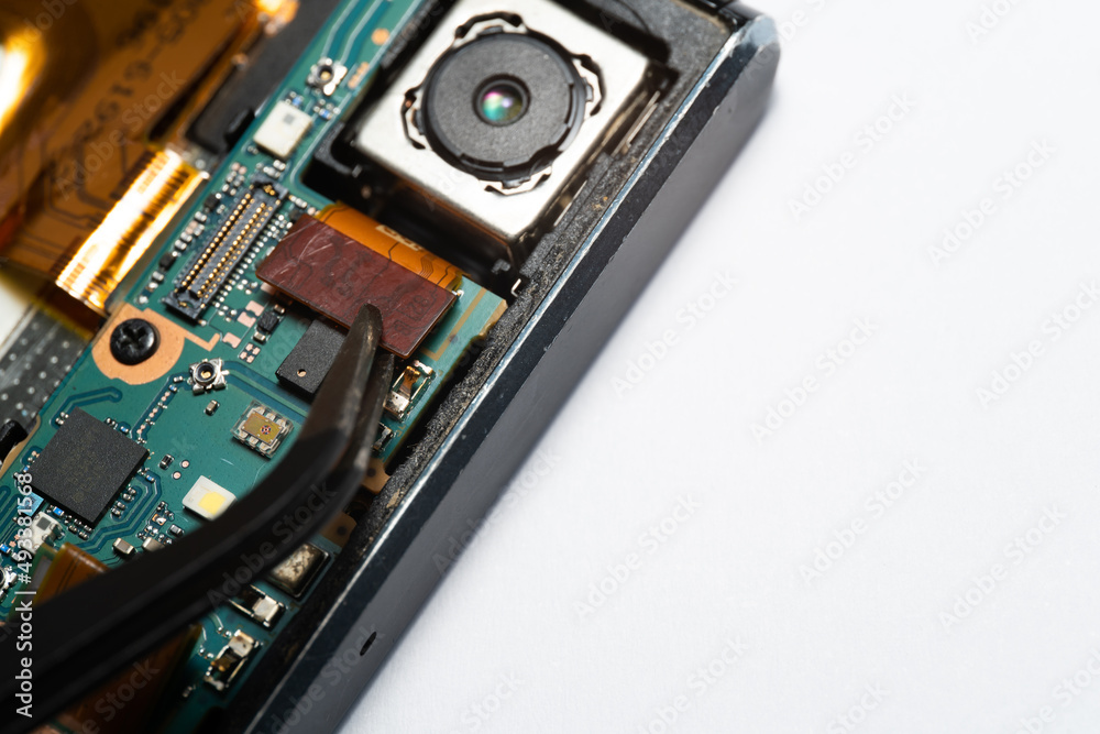 Fototapeta premium camera modules being used in mobile phones. development of mobile cameras. Digital camera lens part. sensor and technology smartphone new high resolution cameras. Mobile phone camera module