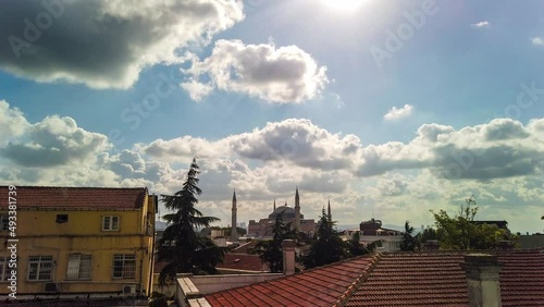 Hagia Sophia domes and minarets in the old town of Istanbul, Turkey. Exterior of the Hagia Sophia in Sultanahmet, Istanbul, on sunny day timelapse photo