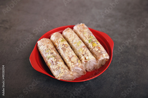 Pootharekulu is a popular sweet in Andhra Pradesh, India photo