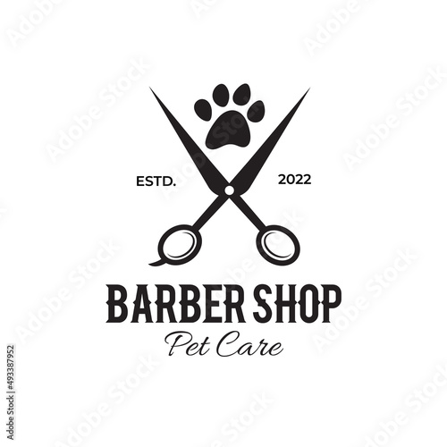 Dog scissors and paw logo design, pet salon dog haircut