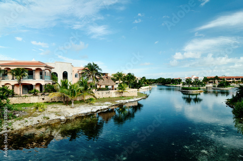 View of the resort town of Puerto Aventuras, A beautiful view of the city on the river bank. Riviera Maya, Mexico.