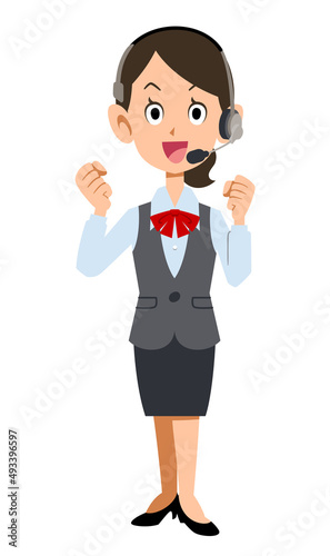 ヘッドセットを装着した制服着用の女性会社員が励ます
