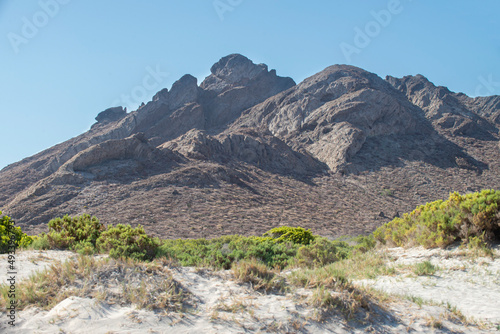 Desert and sea with mountains in the background and beach sands, beautiful landscapes of Baja California Sur, by the Sea of ​​Cortes. La Paz, MEXICO