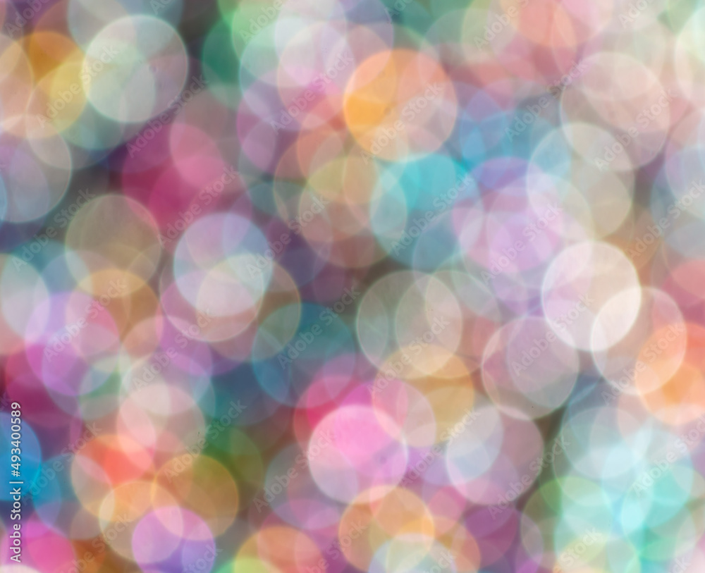 Multicolored festive bokeh as background.