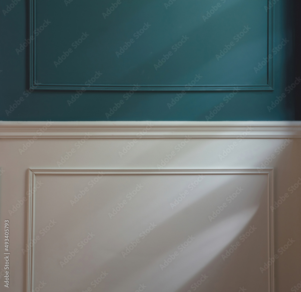 Classic wainscot wood decoration detail. Retro blue and white wall wooden panel, close up view. Classic wainscot wood decoration detail. Retro blue and white wall wooden panel, close up view.