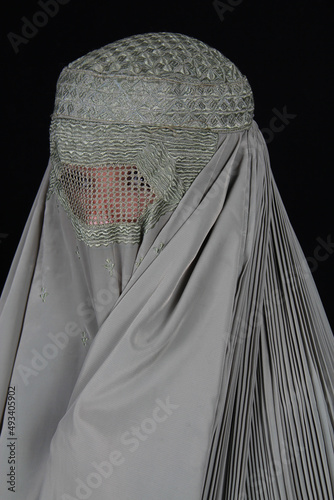 person with a cross
Afghan girl, Afghan woman, Afghan tent 