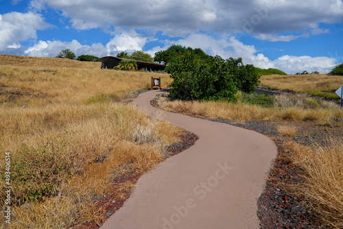 Walking path leading to the Visitor Center of the Pu'ukohola Heiau National Historic Site on the Big Island of Hawai'i in the Pacific Ocean photo