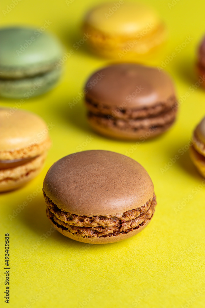 Close-up of macarons cakes of different colors .Culinary and cooking concept. Tasty colorful macaroons. Close-up of macarons cakes of different colors .Culinary and cooking concept. Tasty colorful macaroons.