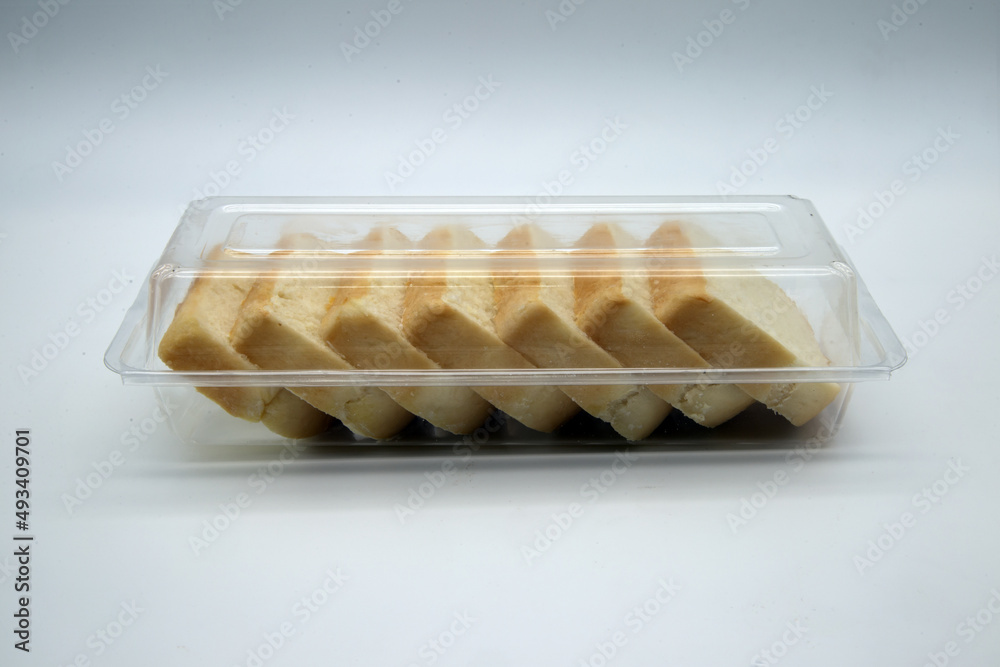 Buttermilk Butter Cake in a Box Bakery Concept Black Background,Include Clipping Path. Buttermilk Butter Cake in a Box Bakery Concept Black Background,Include Clipping Path.