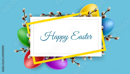 Easter frame with colorful eggs and catkin. Horizontal banner for Easter celebration on blue background