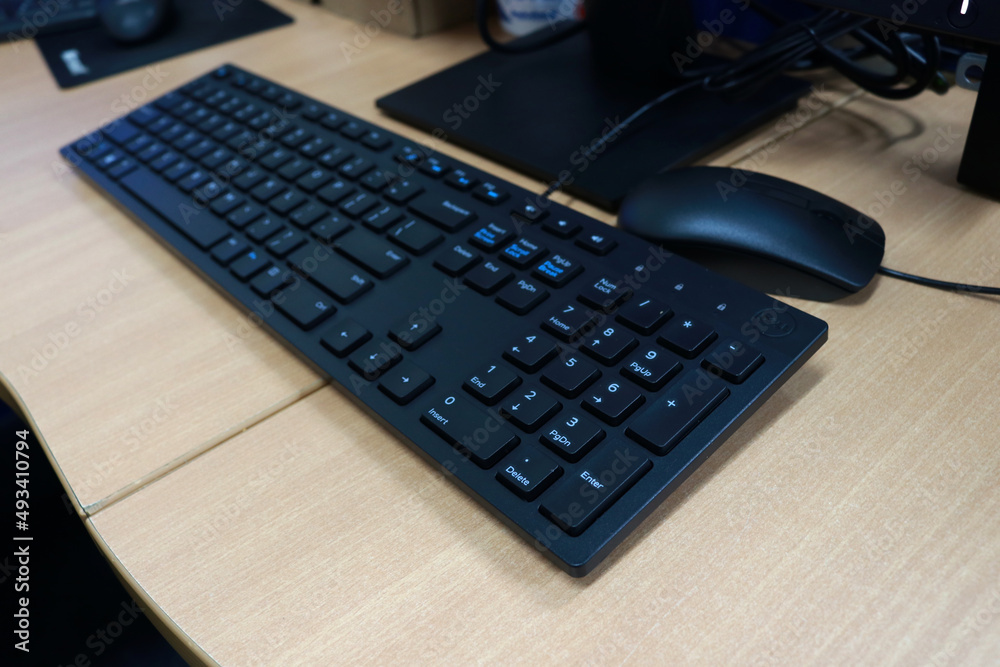 Mouse and keyboard on the office desk, mouse and keyboard are hardware parts of the computer Mouse and keyboard on the office desk, mouse and keyboard are hardware parts of the computer