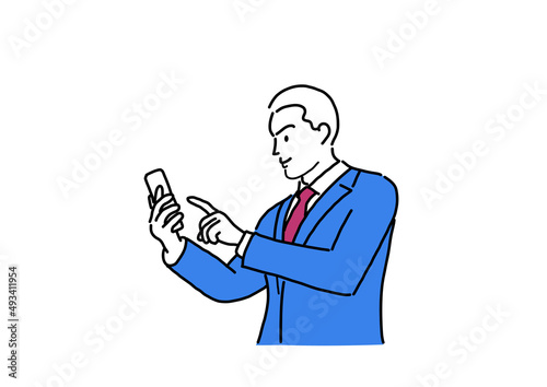 スマートフォンを手にするビジネスマン 