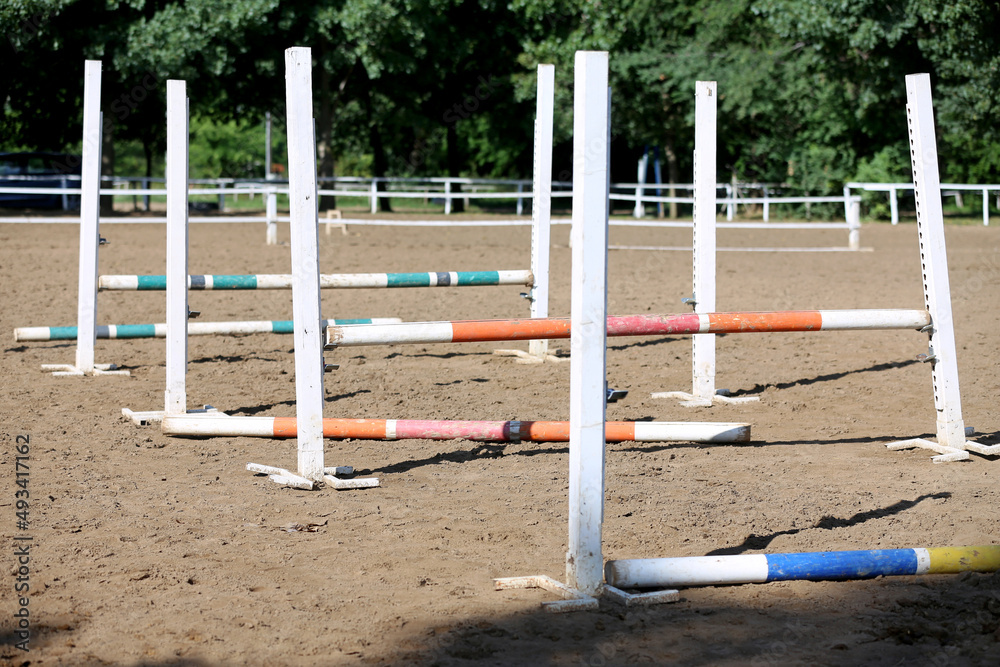 Show jumping poles obstacles, barriers, waiting for riders