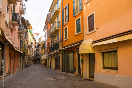 A shopping street at Christmas in Garda town on the east shore of lake Garda, Verona Province, Veneto, north east Italy  © dragoncello