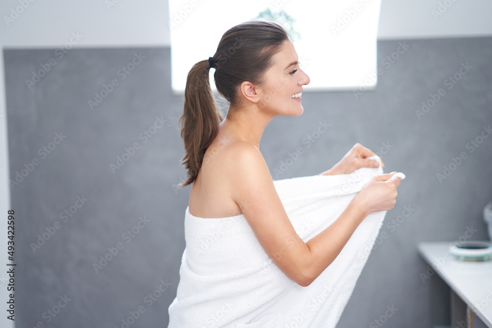 Young nice brunette woman in the bathroom Young nice brunette woman in the bathroom