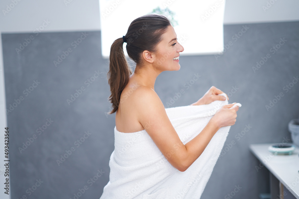 Young nice brunette woman in the bathroom Young nice brunette woman in the bathroom