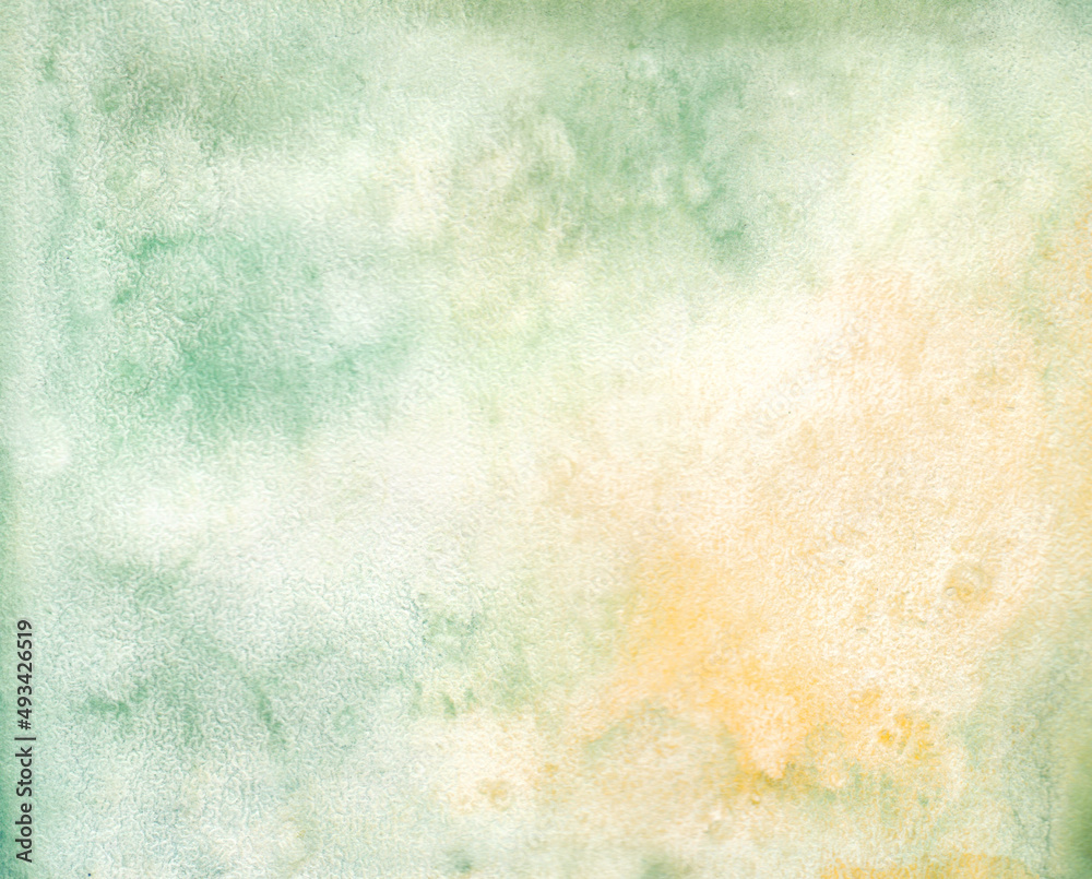 Hand drawn watercolor background of natural green with yellow added. watercolor paper