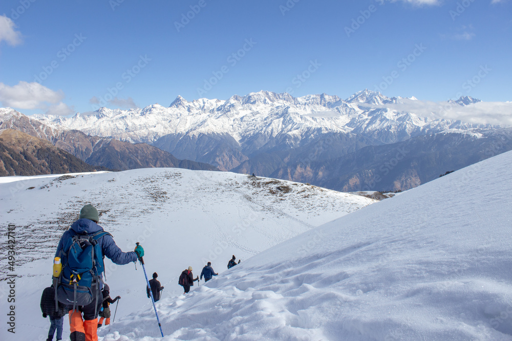 skiing in the mountains