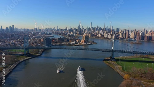 Hi-Speed Aerial Shot of the Hell Gate Bridge and the RFK Bridge