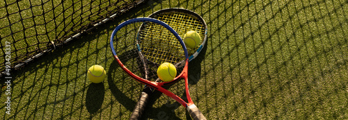 Tennis game. Tennis ball with racket on the tennis court. Sport, recreation concept.