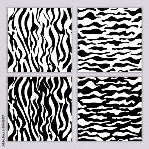 A set of seamless abstract monochrome patterns. Black and white print with wavy lines, dots and spots. Brush strokes are hand-drawn. Vector texture