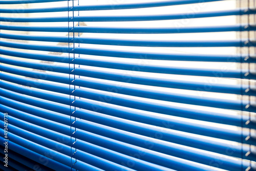 Closed Venetian blinds on a windows