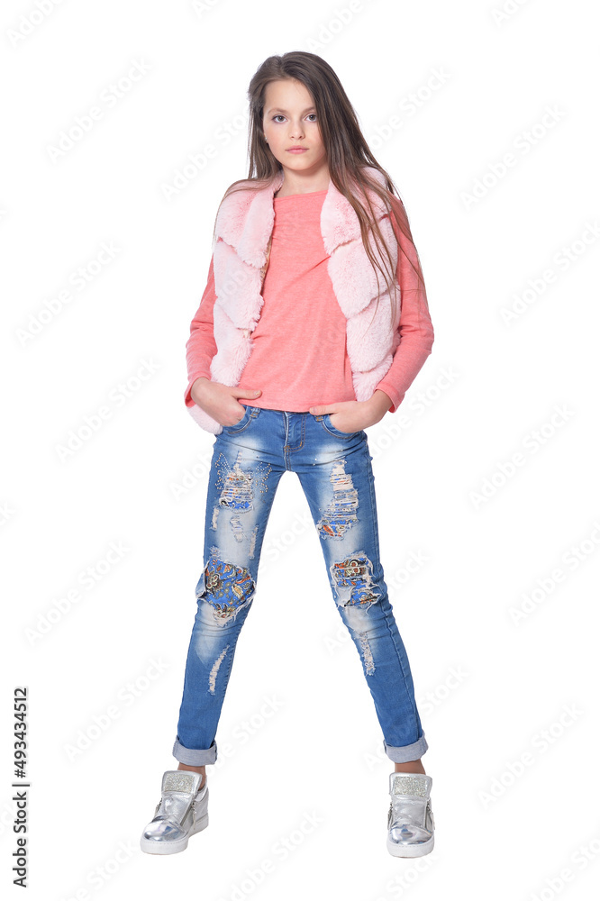 Happy little girl posing in fur waistcoat on white background Happy little girl posing in fur waistcoat on white background
