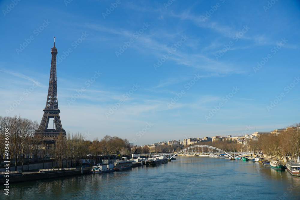 Morning traffic on the streets of Paris next to Seine River. France, 2022. photo during the day. Morning traffic on the streets of Paris next to Seine River. France, 2022. photo during the day.