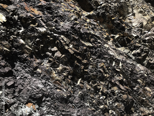 black stone wall for graphic design or wallpaper.