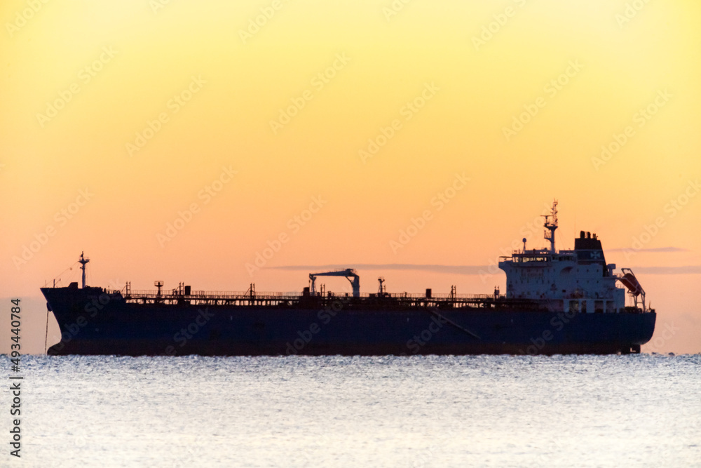 Tanker ship at sunset