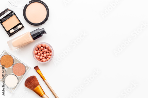 Flat lay of decorative makeup cosmetic products, top view