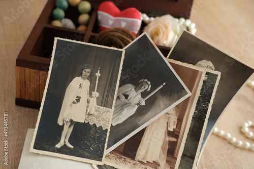 Obraz na plátně dear to heart memorabilia in an old wooden box, stack of retro photos, vintage p