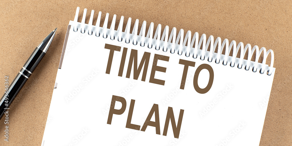 TIME TO PLAN text on a notepad with pen, business TIME TO PLAN text on a notepad with pen, business