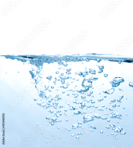 Water splash with bubbles on the white background.