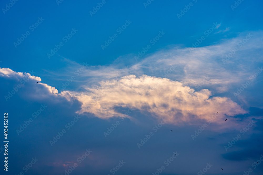 Dramatic twilight sky and clouds at summer sunset