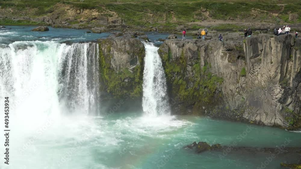 Iceland. Water crashing at powerful Godafoss waterfall. Idyllic view of beautiful Godafoss waterfall. It is a spectacular Icelandic waterfall on the North of island. Iceland. Water crashing at powerful Godafoss waterfall. Idyllic view of beautiful Godafoss waterfall. It is a spectacular Icelandic waterfall on the North of island.